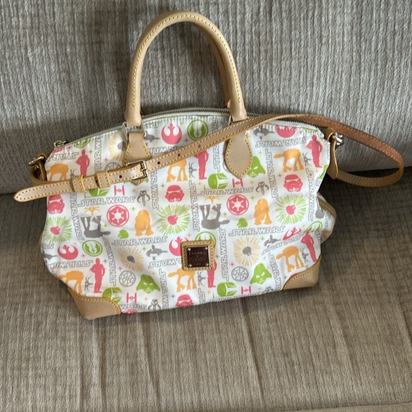 Dooney and Bourke disney’s Star Wars on the light side bag Crossbody
10 x 14 x 6 - Picture 9 of 11